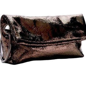 NWT CLUTCH WITH BRACELET HOLDER